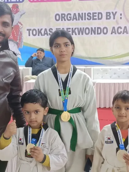 My students showing off their medals after a successful tournament. We had a great haul of golds, silvers, and bronzes.