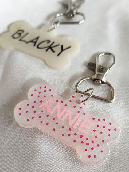 A sweet pair of pet tags for 'Blacky' and 'Annie'. I can do simple, clean designs or add fun patterns like these pink polka dots.