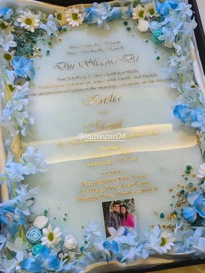 A full view of the blue-themed resin wedding invitation. I can even add a small photo to the design for an extra personal touch.