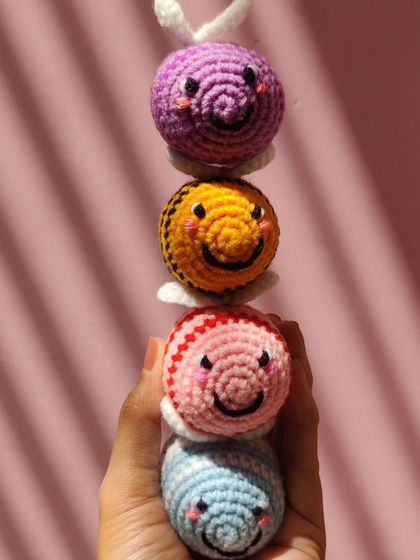 My super popular bumblebee keychains. They come in the classic yellow and black, but I also make them in fun colors like pink, blue, and purple.