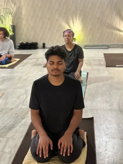 A moment of stillness and focus during an Angamardana session. The goal is not just to perform a posture, but to involve your body, mind, and energy completely. This is where the true transformation happens.