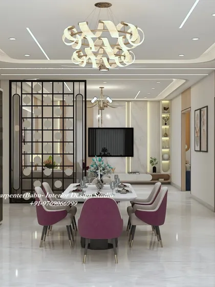 A grand dining space that opens into the living room. The statement chandelier and magenta chairs make the dining area a focal point, perfect for hosting lavish dinners.