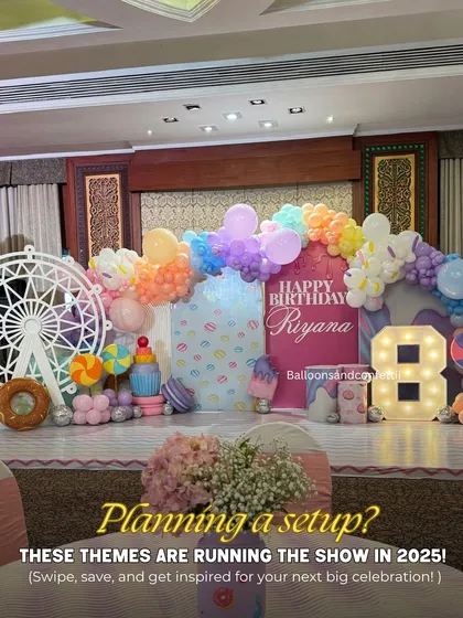 Planning a setup for 2025? This Candyland theme is a spectacular choice, featuring a ferris wheel, giant candy props, and a pastel balloon arch.