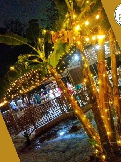 The farm transforms at night with fairy lights, creating a cozy and enchanting atmosphere for our evening events and dinners. It's the perfect escape from the city.