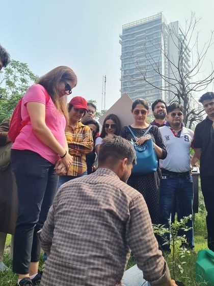 Our team briefs the NatWest volunteers before their planting drive at Ghata Bundh, explaining the history of the site and the ecological importance of their work.