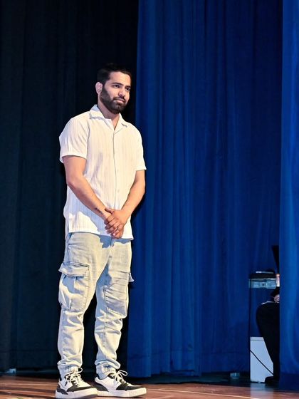 A quiet moment of reflection for me on stage after a successful show. It's a privilege to guide these young dancers and watch them grow.