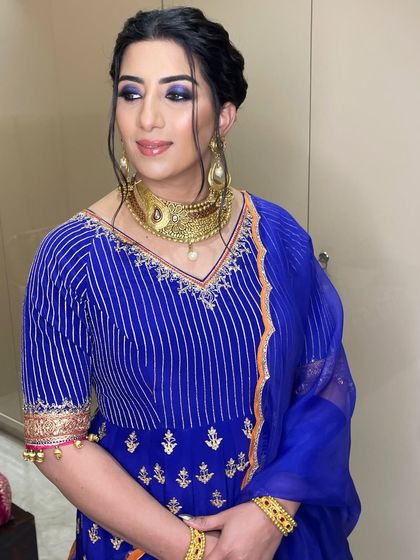 A bold blue smokey eye to match this client's stunning royal blue outfit for a family function. This is how you make a statement with color.