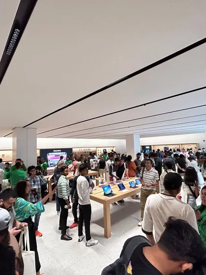 Another view of the bustling crowd on the opening day of the Apple store, showcasing the successful launch of a project we managed from start to finish.