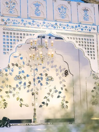 A closer view of the Thikri stage, highlighting the intricate details of the mirror work. The play of light on the reflective surfaces is truly captivating.