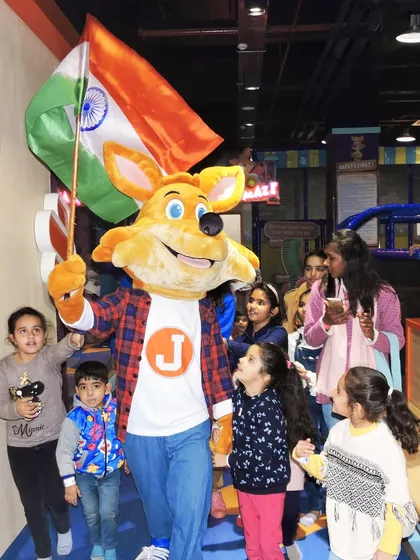 The energy is electric when our mascot, J the Fox, leads the parade. This shot from our Independence Day celebration captures the community spirit and patriotic fun we bring to every festival event.