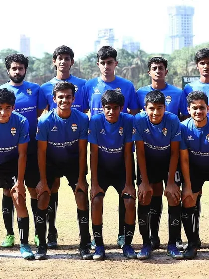 Our MFA Third Division team posing together before a match, ready to represent the academy.