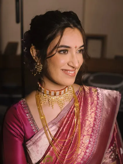 Another angle of Shalmali's classic look, showing how the makeup appears in different lighting while maintaining its elegance.