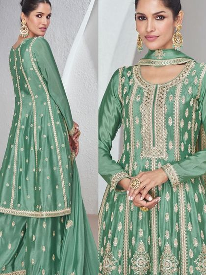 This green Chinon silk palazzo suit is all about sophisticated charm. The top has heavy thread embroidery, and the flowy palazzo pants make it super comfortable yet dressy.