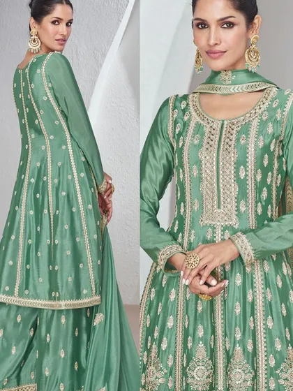 This green Chinon silk palazzo suit is all about sophisticated charm. The top has heavy thread embroidery, and the flowy palazzo pants make it super comfortable yet dressy.