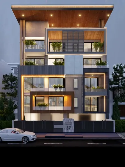 An evening view of a modern residential building, showcasing how strategic lighting design can transform a structure after dark. The interplay of illuminated voids, warm interior glows, and facade highlights creates a dramatic and sophisticated presence, emphasizing the building's multi-layered form.