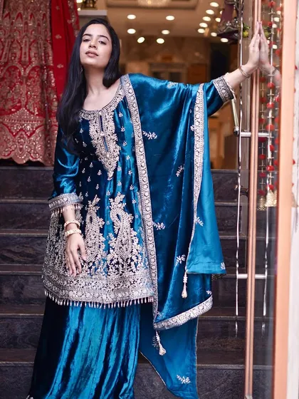 Regal splendor! Wrap yourself in the opulence of this velvet embroidered suit, meticulously crafted to make you shine.