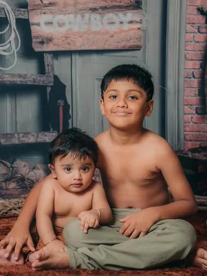 Brotherhood. A classic portrait of two brothers during a fun, cowboy-themed photoshoot.
