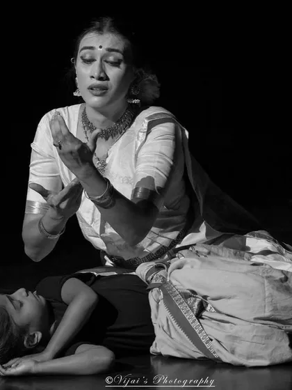 The same scene in black and white, which emphasizes the raw emotion of the performance. My ability to convey powerful feelings is a core part of my storytelling skill set.