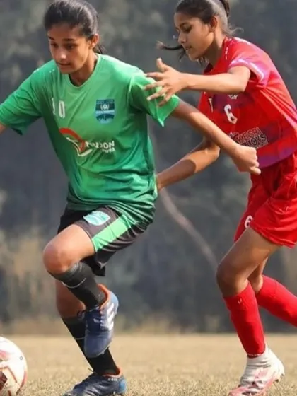 Tanya in action during a competitive match, demonstrating the skill and aggression that make her a top striker.