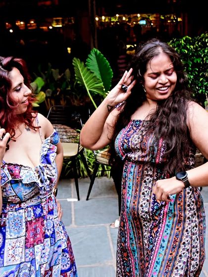 A snapshot from a crazy night at Nusa, with two friends dancing and having a great time.