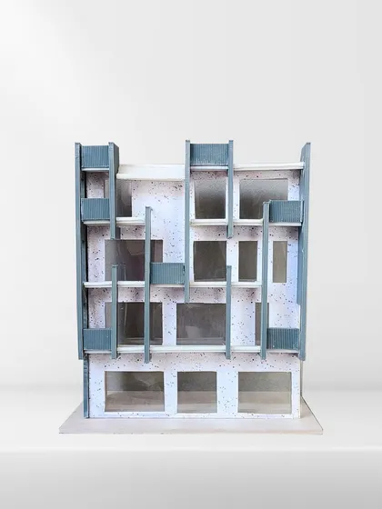 Working with physical models is an integral part of our process. It allows us to move beyond drawings and understand a building's form, scale, and spatial qualities in a tangible way.