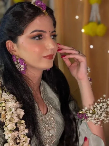 Bhawna looking serene and beautiful during her Haldi. The soft makeup ensures she looks like herself, just an enhanced and more radiant version.