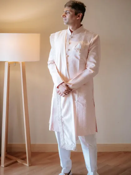 Draping is not just for brides. I also style grooms, like with this elegant shawl drape over a sherwani, creating a perfectly coordinated and regal look for the couple's special day.