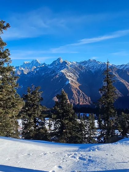The view of the Himalayas from our trail on the Kuari Pass trek. The reward for training hard is getting to witness these incredible, crisp winter panoramas. My job is to make sure you're fit enough to get there.