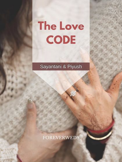 Sometimes the story is in the details. This shot focuses on Sayantani's hands, showing her engagement ring and traditional henna, as she embraces Piyush. It’s a beautiful way to symbolize their commitment.