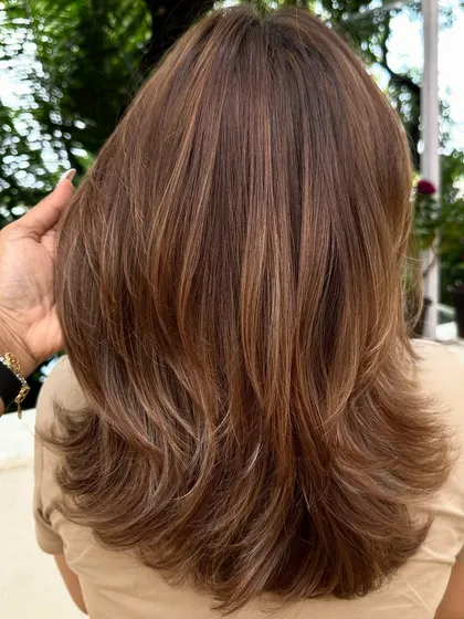 A collection of my hair transformations featuring beautiful warm tones. From caramel to copper, these colors are perfect for adding a sun-kissed glow and dimension.