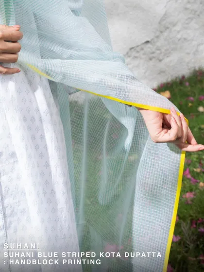 The Suhani blue striped Kota dupatta is light as air and perfect for summer layering. Hand-block printed on breezy Kota cotton, it tells a story in stripes and handwork.