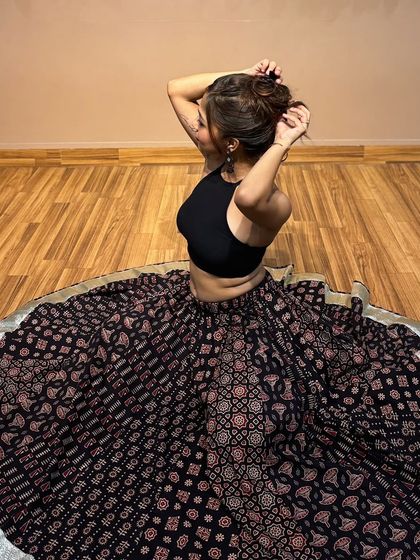 A moment of quiet before the dance begins. This black lehenga is one of my favorites for semi-classical and fusion performances.
