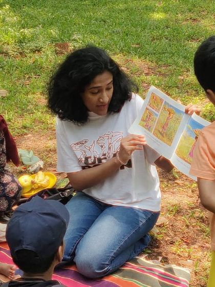 A fantastic series from our reading of 'Handa's Surprise'. My animated storytelling style is on full display, as are the delighted and curious faces of the children.