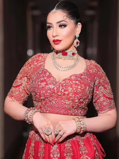 You can never go wrong with a classic red lip. This look is for our timeless brides who want that iconic combination of bold lips, defined eyes, and radiant skin for their wedding day.