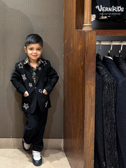 A full look at our star-embellished blazer. The handcrafted details and soft inner lining ensure he feels as amazing as he looks.