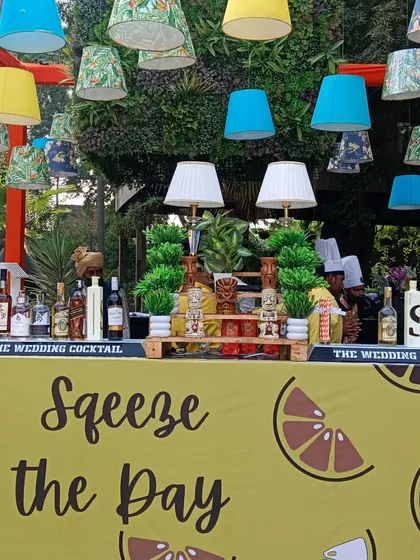 An example of our themed bar capabilities with a 'Squeeze the Day' lemon-themed setup for a vibrant Mehendi party. We can match any theme, from the bar front and decor to the drinks menu itself.
