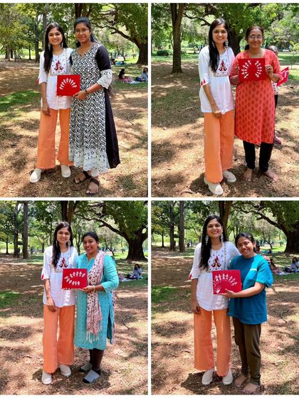 More photos with proud participants from the Warli painting session, each holding their red canvas featuring the classic white stick-figure motifs. These workshops make traditional art fun and accessible.