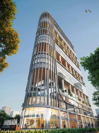 A render and construction photo of the Narmada tower. This highlights the building's unique curved form and the intricate work involved in its construction.