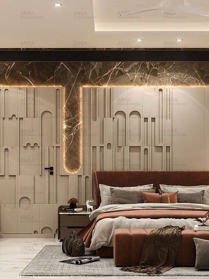 This bedroom design uses a unique, 3D-paneled accent wall to create texture and movement. The warm, earthy tones and modern art piece make the space feel both artistic and deeply comfortable.