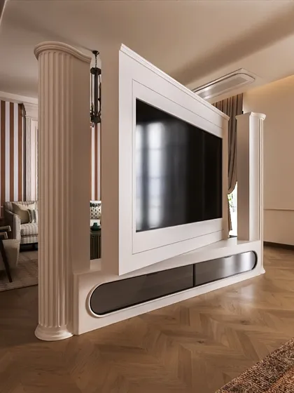 A key feature of this suite is the pivoting TV wall, which can rotate to face either the bed or the lounge area. This bespoke solution offers ultimate flexibility and is a testament to our focus on creating smart, functional designs.