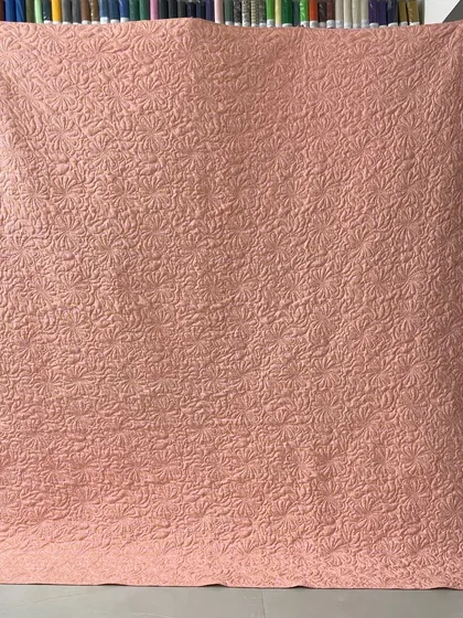 Another view of the beautiful texture on the wholecloth quilt.