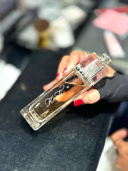 Engraving on a Dior Homme bottle. The clarity of the glass makes the script stand out beautifully.