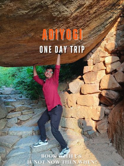 Having some fun posing under a massive boulder during our Adiyogi day trip. It's all about finding joy in the little things.