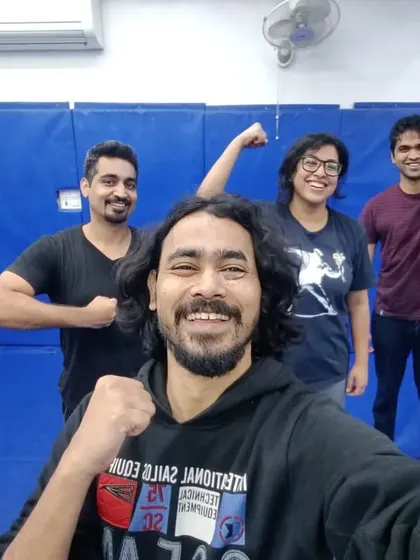 Celebrating the end of another great No-Gi training session. The smiles show the satisfaction of hard work.