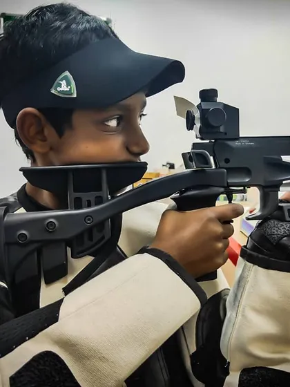 A young shooter learning the fundamentals of aiming with a Hammerli air rifle. We emphasize proper sight picture and trigger control from the very first lesson.