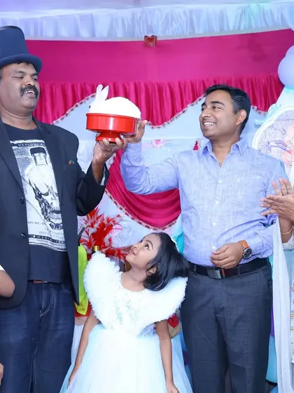 Our team brings timeless magic tricks to your event, like the famous rabbit from a hat illusion. Seeing the whole family's surprised and happy faces is the best part of the job.