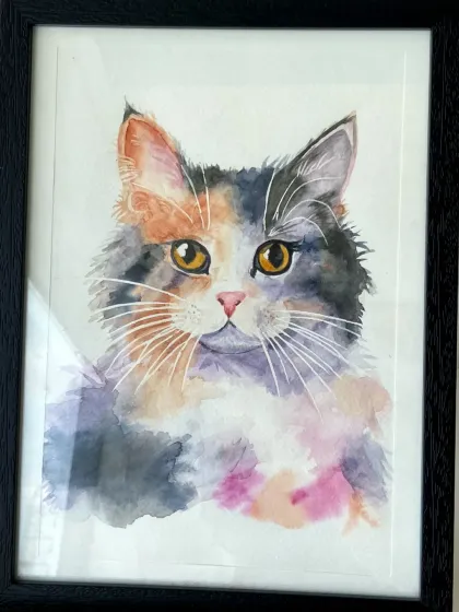 A delicate and expressive watercolor portrait of a calico cat, painted by a student in our short-term course.