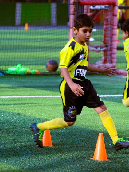 We use a variety of equipment like cones to keep our drills engaging and effective for skill development.