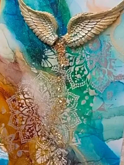 This is an example of how my 7-inch angel wings can elevate a piece of art. Here, they are the centerpiece of a vibrant alcohol ink and mixed media artwork, adding texture, depth, and a spiritual touch.