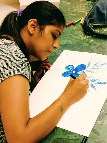Sketching and drawing are foundational skills we explore in my adult classes. This student is using markers to create a delicate and stylized floral design.